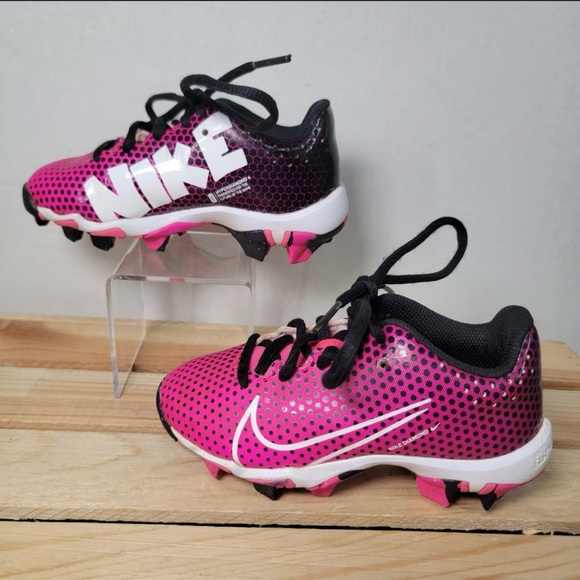 purple and white softball cleats